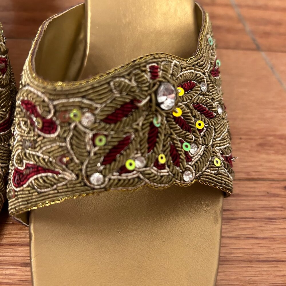 Gold and red heels